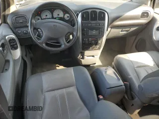 2006 Dodge Grand Caravan SXT z VIN 2D4GP44L06R699332, wystawiony jako Copart lot #58995465 z przebiegiem 55 324 mil mil oraz Szkoda całkowita • Salvage title. Historia ofert i sprzedaży dostępna na DreamBid. Obrazek 8.