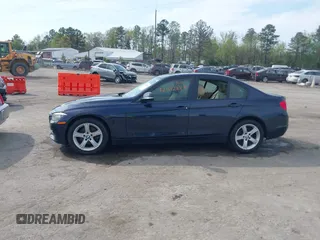 2013 BMW 3 Series 328i xDrive with VIN WBA3B5G53DNS02293, listed as a IAAI auction lot 42012883 with 243,490 mi miles. Bid and sale history available at carsss.com. Image 14.
