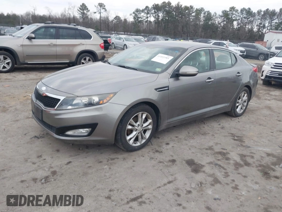 2013 Kia Optima EX with VIN 5XXGN4A75DG185427, listed as a IAAI auction lot 41403385 with 90,015 mi miles. Bid and sale history available at carsss.com. Image 2.