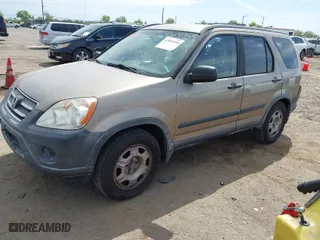 2006 Honda CR-V LX with VIN JHLRD68536C029291, listed as a IAAI auction lot 42031959 with 195,392 mi miles. Bid and sale history available at carsss.com. Image 2.
