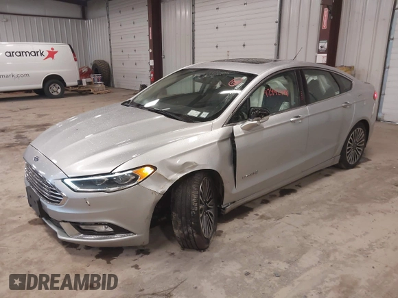 2018 Ford Fusion Titanium with VIN 3FA6P0RU9JR131818, listed as a IAAI auction lot 42442448 with 191,757 mi miles and . Bid and sale history available at DreamBid. Image 2.