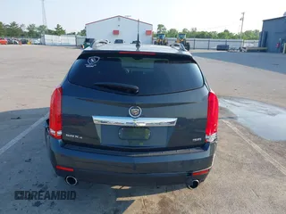 2014 Cadillac SRX Performance Collection with VIN 3GYFNFE35ES663320, listed as a IAAI auction lot 42480235 with 112,406 mi miles and . Bid and sale history available at DreamBid. Image 16.