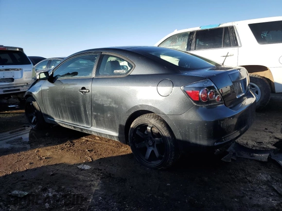 2009 Scion tC with VIN JTKDE167990279631, listed as a Copart auction lot 43079415 with 185,882 mi miles and Salvage Title. Bid and sale history available at carsss.com. Image 2.