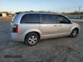 2010 Dodge Grand Caravan SXT with VIN 2D4RN5D16AR496795, listed as a Copart auction lot 83374834 with 99,902 mi miles and Salvage Title. Bid and sale history available at DreamBid. Image 3.