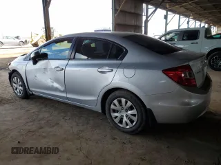 2012 Honda Civic LX z VIN 2HGFB2F59CH580899, wystawiony jako Copart lot #59803775 z przebiegiem 96 323 mil mil oraz Szkoda całkowita • Salvage title. Historia ofert i sprzedaży dostępna na DreamBid. Obrazek 2.