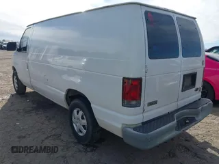 2002 Ford Econoline Cargo with VIN 1FTRE14252HB67887, listed as a IAAI auction lot 41180872 with 274,561 mi miles and . Bid and sale history available at carsss.com. Image 3.