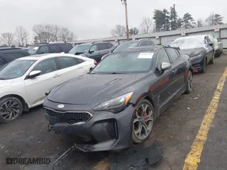 2020 Kia Stinger GT2 with VIN KNAE55LCXL6071473, listed as a IAAI auction lot 41447155 with 123,110 mi miles. Bid and sale history available at carsss.com. Image 2.
