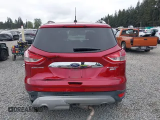 2014 Ford Escape Titanium with VIN 1FMCU9J9XEUD71715, listed as a IAAI auction lot 42127982 with 96,549 mi miles and . Bid and sale history available at DreamBid. Image 16.