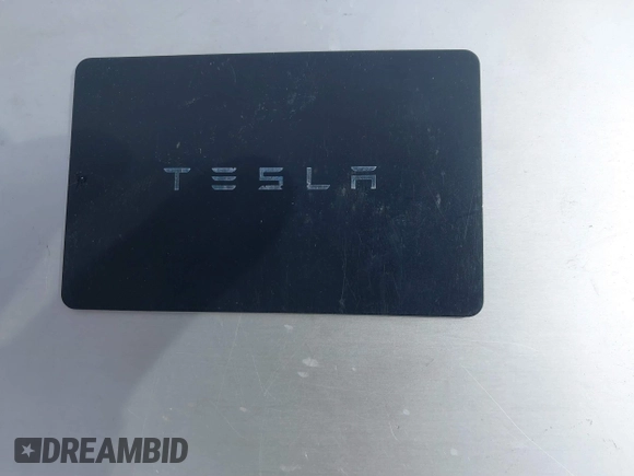 2022 Tesla Model Y Long Range with VIN 7SAYGDEE0NA019067, listed as a IAAI auction lot 41645198 with 49,336 mi miles and . Bid and sale history available at DreamBid. Image 11.