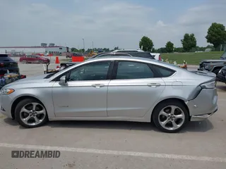 2013 Ford Fusion SE Hybrid с VIN 3FA6P0LU7DR267300, выставлен на аукционе IAAI как лот 42376940 с пробегом 148 298 миль миль и . История ставок и продаж доступна на DreamBid. Изображение 14.