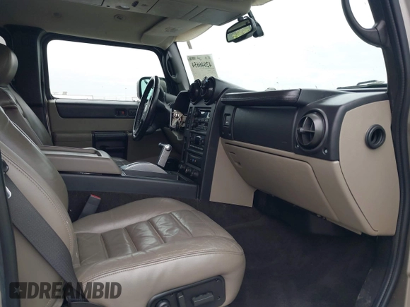 2005 Hummer H2 SUV with VIN 5GRGN23U95H129470, listed as a IAAI auction lot 42046654 with 63,489 mi miles. Bid and sale history available at carsss.com. Image 5.