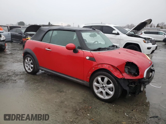 2009 MINI Convertible with VIN WMWMR33539TU96291, listed as a Copart auction lot 83849744 with 65,056 mi miles and Salvage title. Bid and sale history available at DreamBid. Image 4.