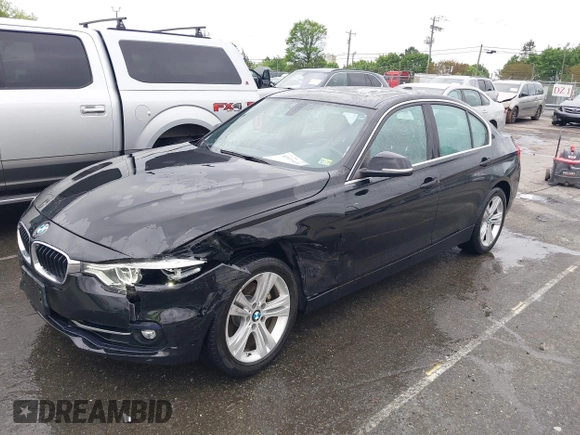 2018 BMW 3 Series 330i xDrive with VIN WBA8D9G50JNU69376, listed as a IAAI auction lot 41971138 with 61,551 mi miles. Bid and sale history available at carsss.com. Image 2.