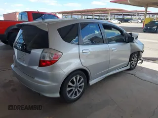 2013 Honda Fit Sport with VIN JHMGE8H54DC047839, listed as a IAAI auction lot 42083683 with 201,284 mi miles. Bid and sale history available at carsss.com. Image 4.