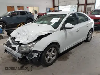2014 Chevrolet Cruze 1LT with VIN 1G1PC5SB2E7182213, listed as a IAAI auction lot 40787686 with 129,882 mi miles and . Bid and sale history available at DreamBid. Image 2.