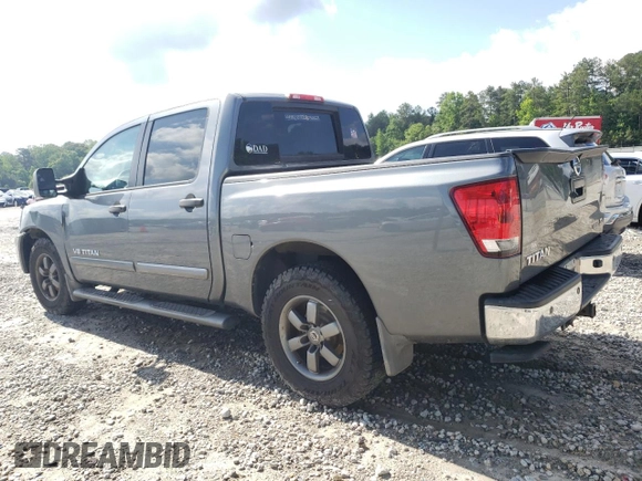 2014 Nissan Titan SV with VIN 1N6BA0ED0EN517002, listed as a Copart auction lot 57885435 with 139,910 mi miles and Salvage title. Bid and sale history available at DreamBid. Image 2.