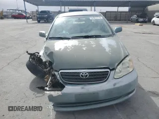 2005 Toyota Corolla CE with VIN 1NXBR32E85Z365739, listed as a Copart auction lot 51977715 with 190,401 mi miles and Salvage Title. Bid and sale history available at DreamBid. Image 5.