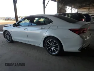 2020 Acura TLX with VIN 19UUB2F36LA001548, listed as a Copart auction lot 71017274 with 76,107 mi miles and Salvage Title. Bid and sale history available at carsss.com. Image 2.
