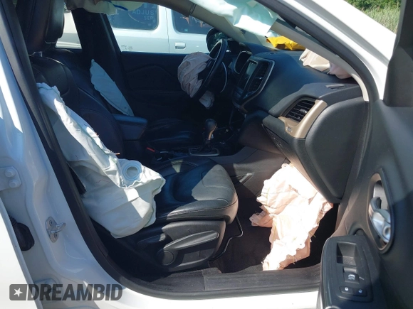 2016 Jeep Cherokee Limited with VIN 1C4PJMDB7GW122814, listed as a IAAI auction lot 42549356 with 132,886 mi miles and . Bid and sale history available at DreamBid. Image 5.
