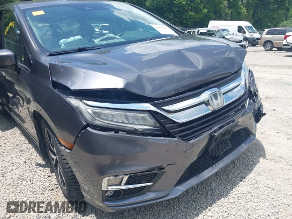 2018 Honda Odyssey Elite with VIN 5FNRL6H95JB087952, listed as a IAAI auction lot 42579817 with 96,577 mi miles and . Bid and sale history available at DreamBid. Image 20.