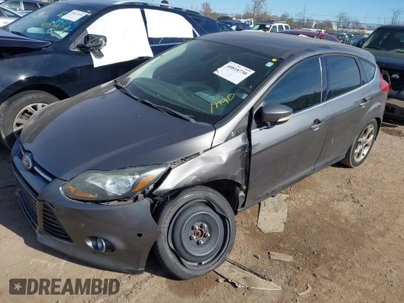 2012 Ford Focus Titanium with VIN 1FAHP3N27CL354309, listed as a IAAI auction lot 40818730 with 155,107 mi miles and . Bid and sale history available at carsss.com. Image 2.