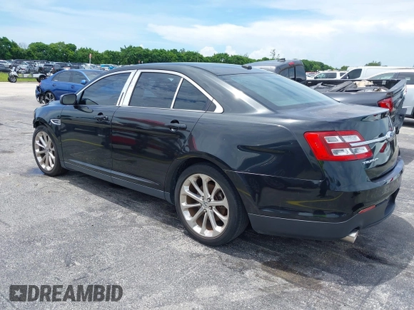 2013 Ford Taurus Limited with VIN 1FAHP2F84DG220283, listed as a IAAI auction lot 40045974 with 155,409 mi miles and . Bid and sale history available at DreamBid. Image 3.