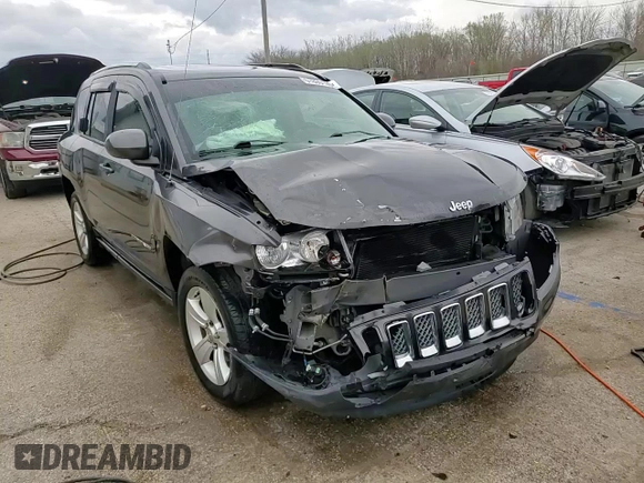 2014 Jeep Compass Latitude with VIN 1C4NJDEB4ED904731, listed as a Copart auction lot 51809165 with 104,760 mi miles and Salvage Title. Bid and sale history available at DreamBid. Image 14.