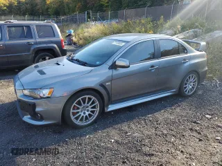 2014 Mitsubishi Lancer Evolution GSR with VIN JA32W8FV6EU018171, listed as a Copart auction lot 77109934 with 83,467 mi miles and Clean Title. Bid and sale history available at carsss.com. Image 1.