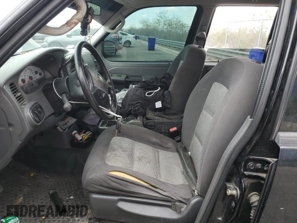 2005 Ford Explorer Sport Trac XLS z VIN 1FMZU67K15UB77562, wystawiony jako Copart lot #59619895 z przebiegiem 122 810 mil mil oraz Szkoda całkowita • Salvage title. Historia ofert i sprzedaży dostępna na DreamBid. Obrazek 7.