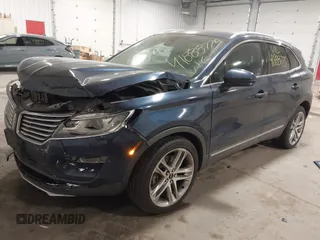2015 Lincoln MKC with VIN 5LMTJ2AH0FUJ28744, listed as a IAAI auction lot 41888775 with 145,872 mi miles. Bid and sale history available at carsss.com. Image 17.