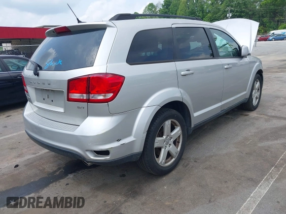 2012 Dodge Journey SXT z VIN 3C4PDCBGXCT324756, wystawiony jako IAAI lot #42422533 z przebiegiem 241 934 mil mil oraz . Historia ofert i sprzedaży dostępna na DreamBid. Obrazek 4.