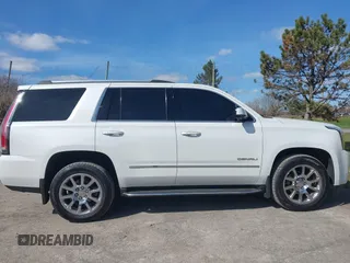 2017 GMC Yukon Denali with VIN 1GKS2CKJ4HR148397, listed as a IAAI auction lot 41942659 with 167,719 mi miles. Bid and sale history available at carsss.com. Image 13.