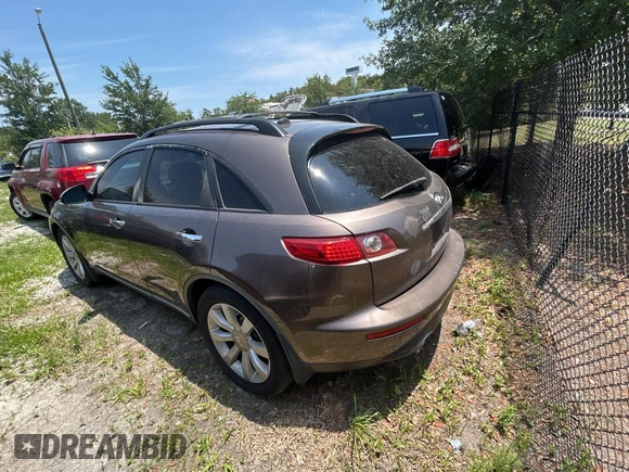 2003 Infiniti FX Options z VIN JNRAS08W93X205643, wystawiony jako Copart lot #58410885 z przebiegiem 210 110 mil mil oraz Tytuł czysty. Historia ofert i sprzedaży dostępna na DreamBid. Obrazek 3.