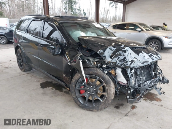 2023 Dodge Durango SRT 392 Premium with VIN 1C4SDJGJ6PC592871, listed as a IAAI auction lot 41740993 with 9,028 mi miles and . Bid and sale history available at DreamBid. Image 1.
