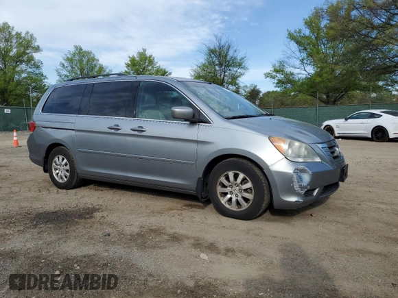 2009 Honda Odyssey EX-L with VIN 5FNRL38679B054712, listed as a Copart auction lot 54248165 with 190,573 mi miles and Clean Title. Bid and sale history available at DreamBid. Image 4.