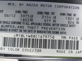 2012 Mazda 3 i Grand Touring with VIN JM1BL1W88C1679758, listed as a IAAI auction lot 41947522 with 195,715 mi miles. Bid and sale history available at carsss.com. Image 9.
