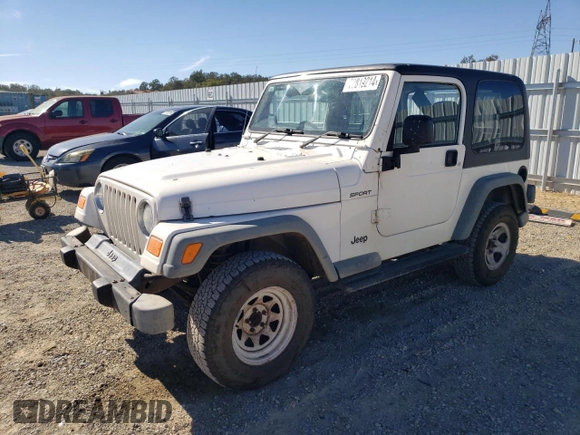 2006 Jeep Wrangler Sport Right Hand Drive with VIN 1J4F449S76P747454, listed as a Copart auction lot 77819214 with 184,763 mi miles and Salvage Title. Bid and sale history available at carsss.com. Image 1.