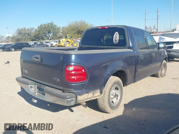 2003 Ford F-150 XLT with VIN 1FTRW07673KC94022, listed as a IAAI auction lot 41789268 with 271,047 mi miles. Bid and sale history available at carsss.com. Image 4.