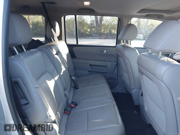 2015 Honda Pilot EX-L with VIN 5FNYF4H57FB006655, listed as a IAAI auction lot 41822385 with 125,915 mi miles and . Bid and sale history available at carsss.com. Image 8.