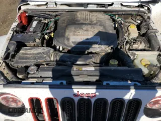 2015 Jeep Wrangler Unlimited Altitude with VIN 1C4BJWEG2FL683566, listed as a Copart auction lot 89135655 with 163,674 mi miles and Clean title. Bid and sale history available at DreamBid. Image 13.