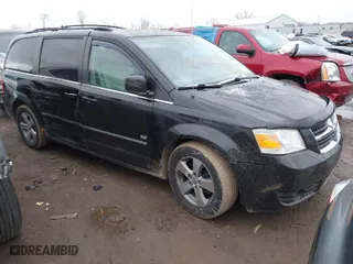 2009 Dodge Grand Caravan SXT with VIN 2D8HN54X39R672728, listed as a IAAI auction lot 41694045 with 184,594 mi miles. Bid and sale history available at carsss.com. Image 1.