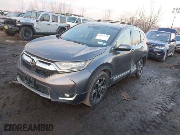 2017 Honda CR-V Touring with VIN 2HKRW2H94HH617081, listed as a IAAI auction lot 41294254 with 145,140 mi miles. Bid and sale history available at carsss.com. Image 18.