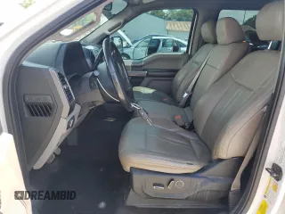 2018 Ford F-150 XL with VIN 1FTEW1EP0JFA28850, listed as a Copart auction lot 63585615 with 210,626 mi miles and Salvage title. Bid and sale history available at DreamBid. Image 7.