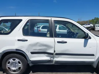 2006 Honda CR-V LX with VIN JHLRD68546C026819, listed as a IAAI auction lot 41883259 with 136,150 mi miles. Bid and sale history available at carsss.com. Image 6.