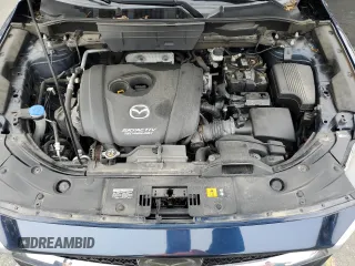2018 Mazda CX-5 Touring with VIN JM3KFBCM9J0433729, listed as a Copart auction lot 49945515 with 143,064 mi miles and Salvage Title. Bid and sale history available at carsss.com. Image 12.