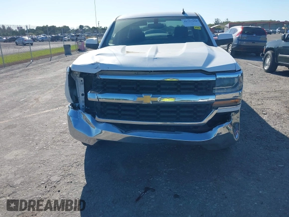 2018 Chevrolet Silverado 1500 LT with VIN 1GCRCREC1JZ153165, listed as a IAAI auction lot 41737258 with 130,475 mi miles and . Bid and sale history available at DreamBid. Image 6.