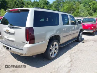 2007 Chevrolet Suburban LS with VIN 1GNFC16087J218794, listed as a IAAI auction lot 42700630 with 262,428 mi miles and . Bid and sale history available at DreamBid. Image 4.