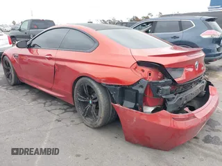 2013 BMW M6 z VIN WBSLX9C55DC968497, wystawiony jako IAAI lot #41863884 z przebiegiem 128 241 mil mil oraz . Historia ofert i sprzedaży dostępna na DreamBid. Obrazek 15.