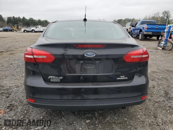 2016 Ford Focus SE with VIN 1FADP3F26GL397557, listed as a Copart auction lot 52165405 with 102,245 mi miles and Salvage Title. Bid and sale history available at carsss.com. Image 6.