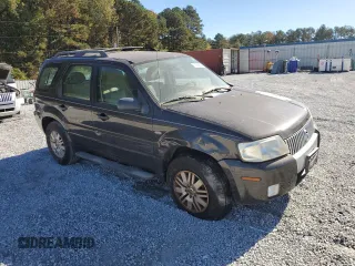 2006 Mercury Mariner Convenience z VIN 4M2YU56Z06KJ00794, wystawiony jako Copart lot #79389584 z przebiegiem 211 103 mil mil oraz Szkoda całkowita • Salvage title. Historia ofert i sprzedaży dostępna na DreamBid. Obrazek 4.